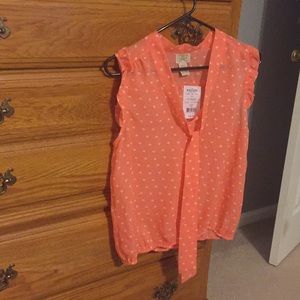 Sleeveless blouse.  Size medium.  Brand new.